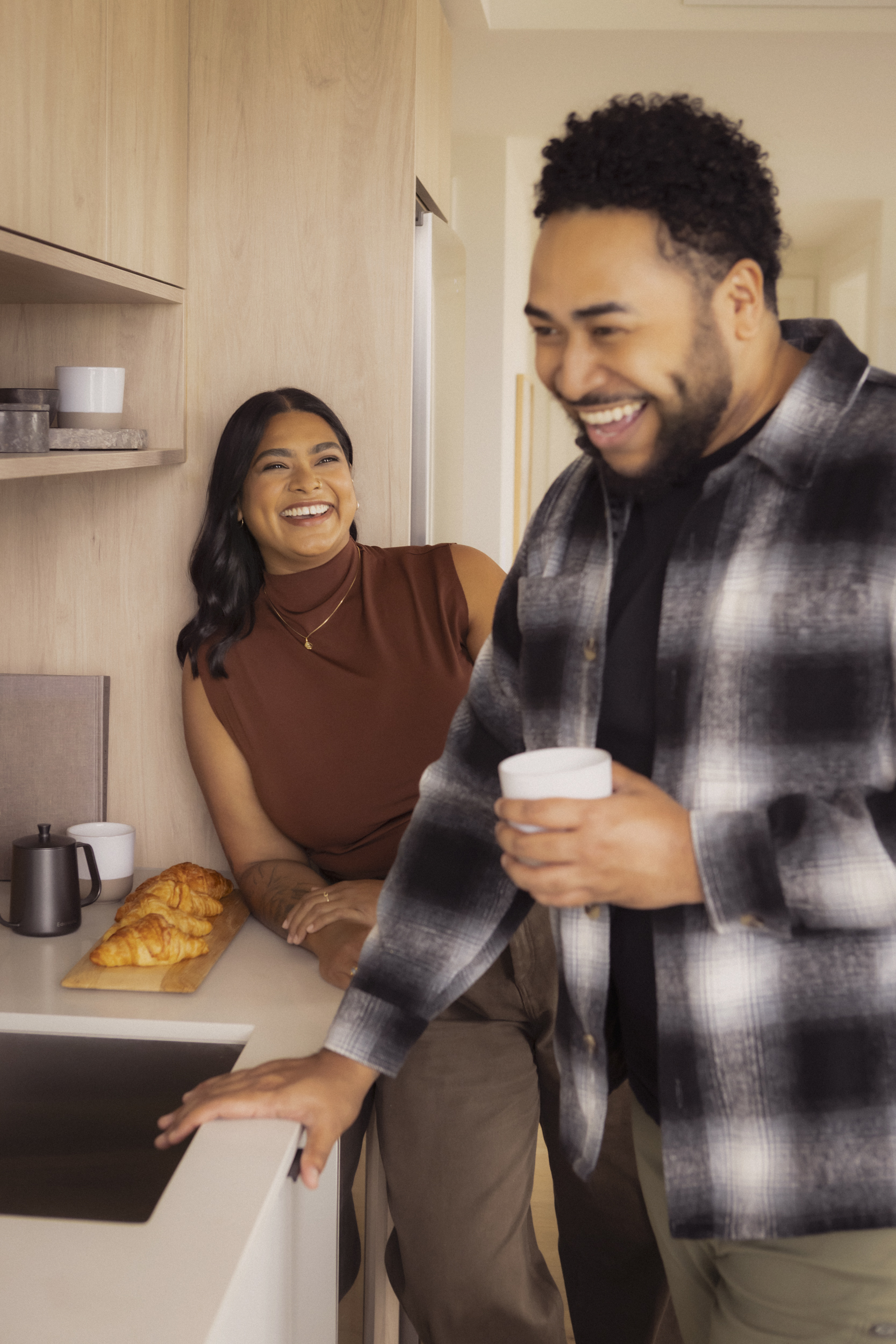 Couple in Kitchen | Vancouver Real Estate Developer | Peterson